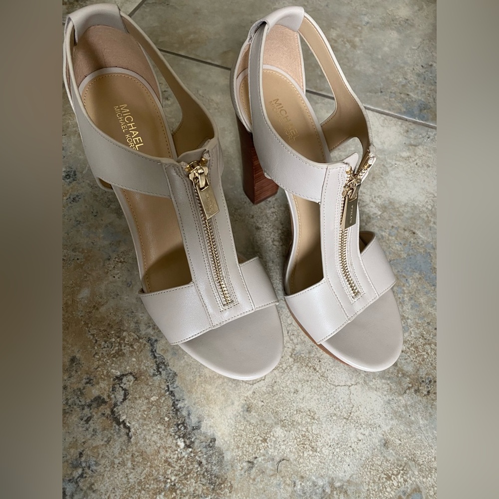 Michael Kors heels. New, worn inside the home for about an hour. Size 8 1/2.